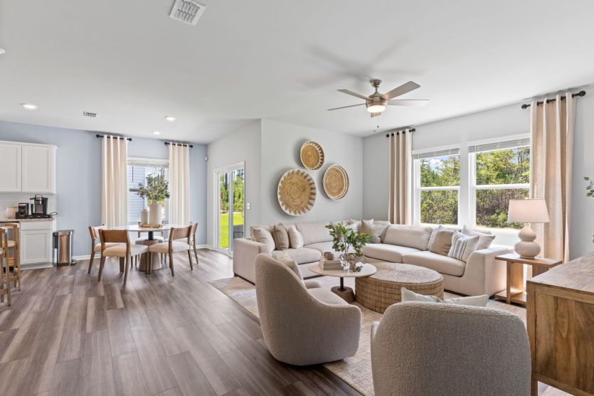 Dining Area conveniently next to Living Room. Model Home Representation.