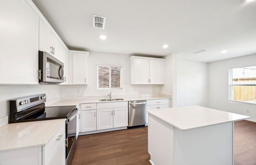 Spacious kitchen with abundant cabinet space *photos are not of actual home, some features vary