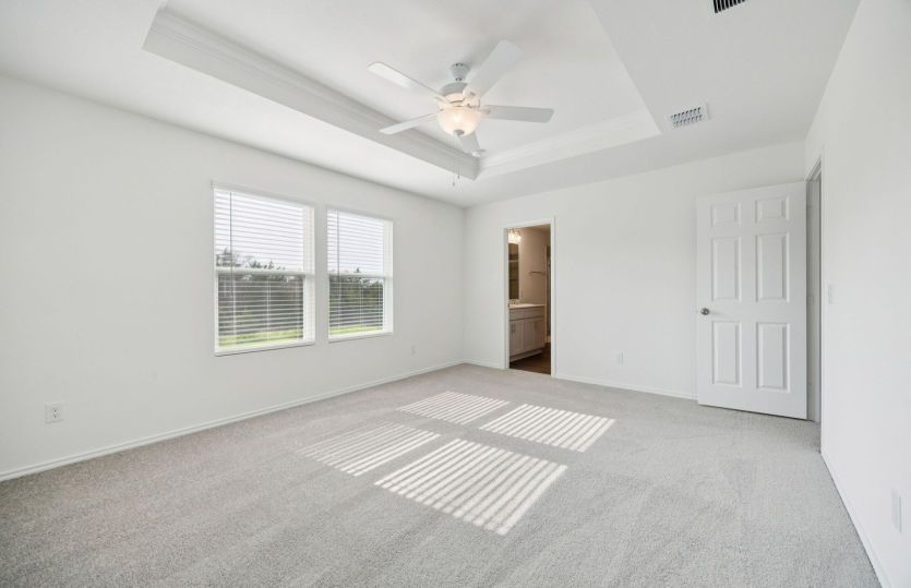Spacious owner's suite with private bath