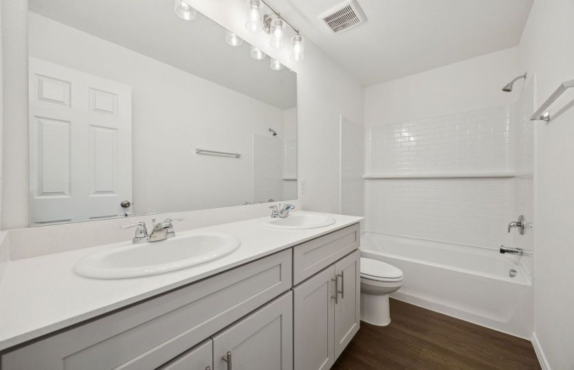 Secondary bathroom with double vanity