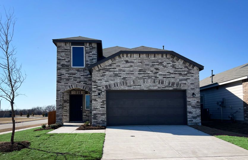 The Toyah, a two-story home with 2-car garage *exterior features may differ