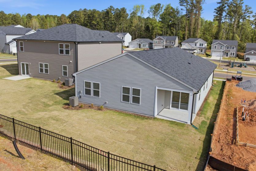 Ibis #95 - Aerial View of Backyard & Covered Back Porch
