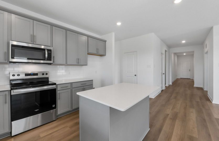 Representational Photo-Front Entry Leading to the Kitchen