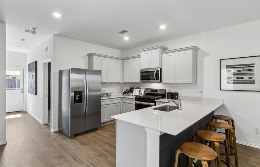 Eat-in bartop island in kitchen *model representation