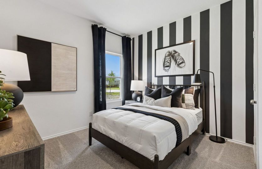 Spacious secondary bedroom *model representation