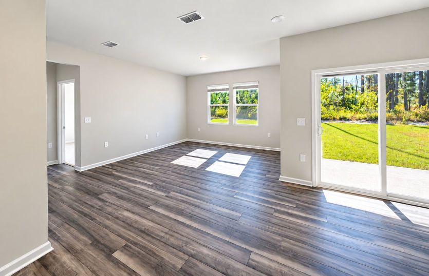 Open living room filled with plenty of natural light.