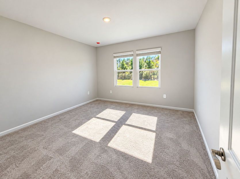 Spacious owner’s suite designed for comfort and relaxation.