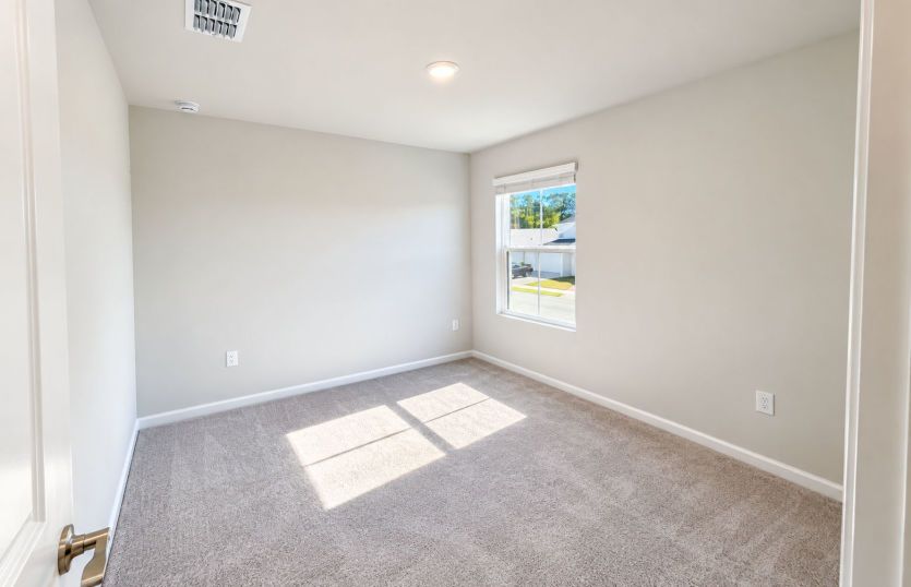 Inviting secondary bedroom ideal for guests or family.