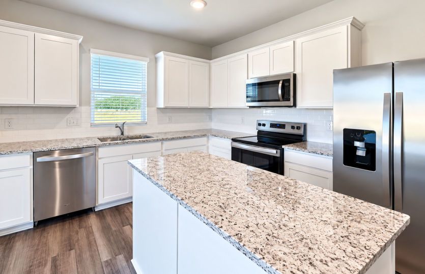 Well-appointed kitchen with a fresh, modern look and functional design.