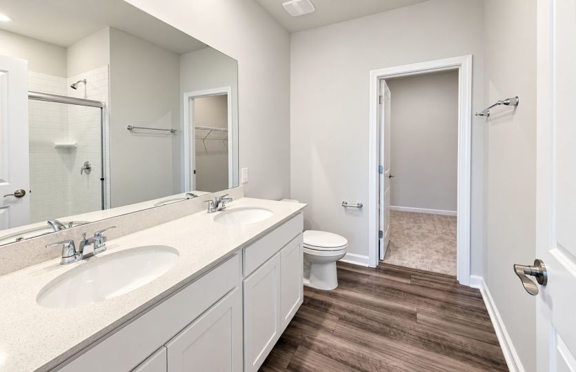 Owner’s bath with stylish details and a calming feel.