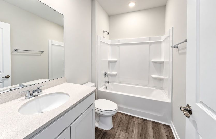 Secondary bath with a functional layout and tasteful finishes.