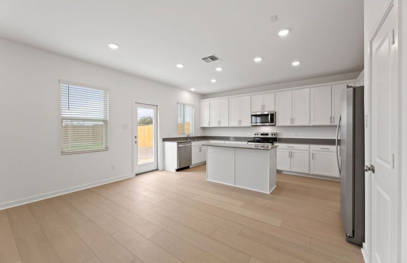 Representational Photo- Kitchen Open to the Gathering Space