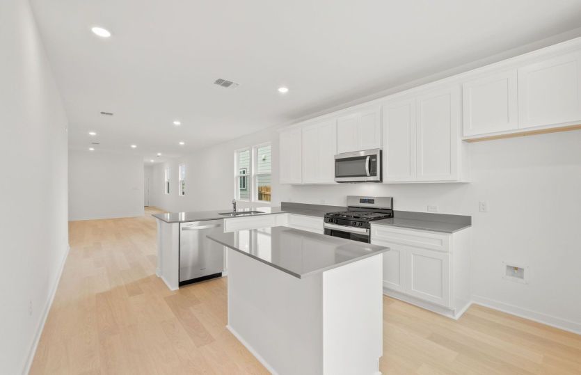 Representational Photo- Kitchen Open to the Gathering Space