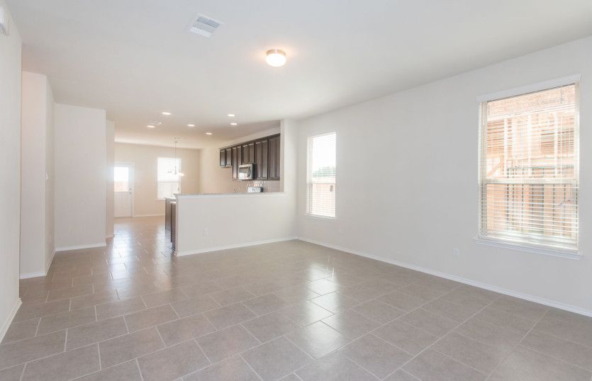 Gathering room with view of kitchen