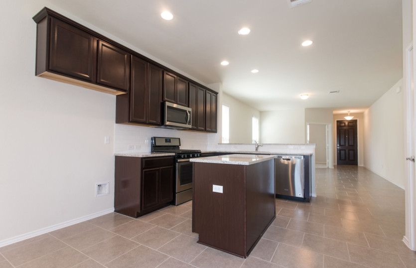 Spacious kitchen with recessed lighting
