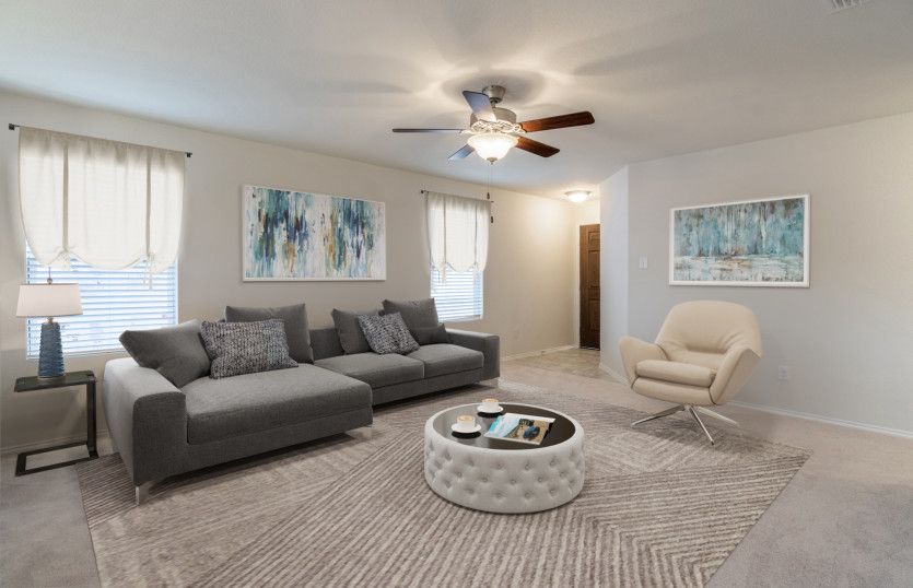 Spacious gathering room with large windows *model representation