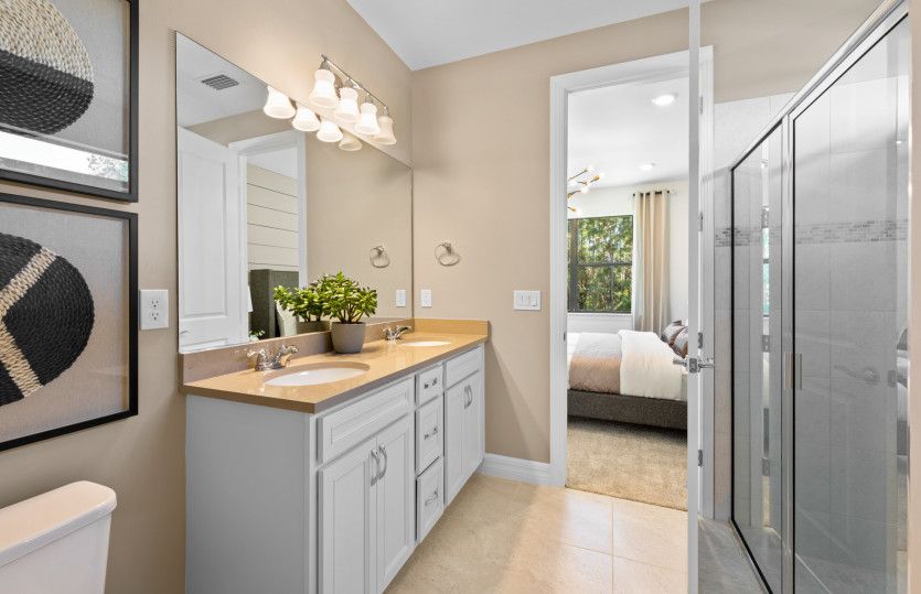Owner's bathroom with dual sink vanity