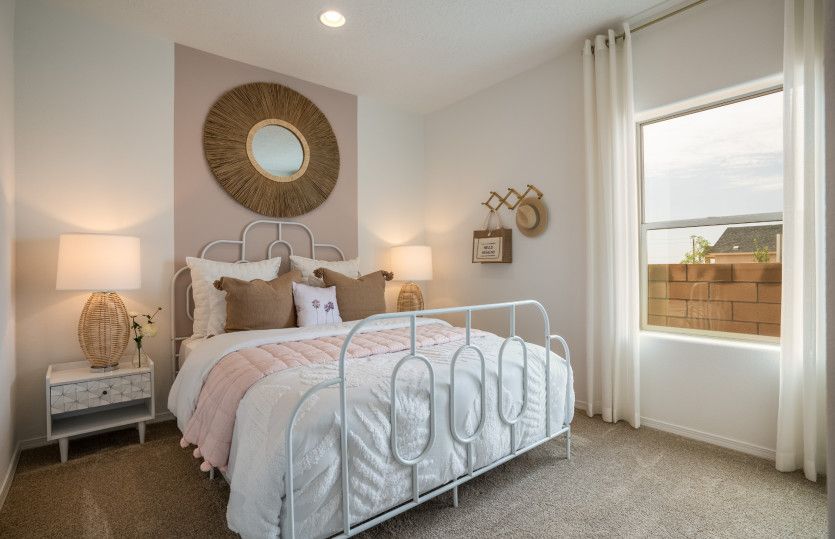 Off the foyer, you'll find bedroom 2 that is perfectly suited for a children's bedroom or hosting ov