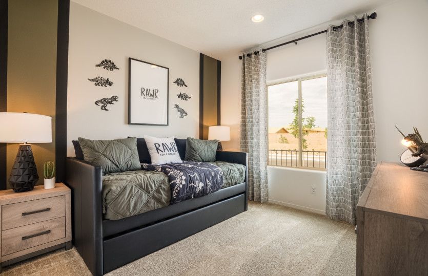 Off the foyer, you'll find bedroom 3 that is perfectly suited for a children's bedroom or hosting ov