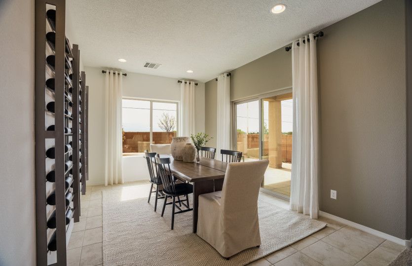 Off the kitchen, you'll find the café with a large sliding glass door to the backyard.