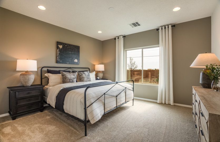 The owner's suite is spacious and designed with comfort in mind.