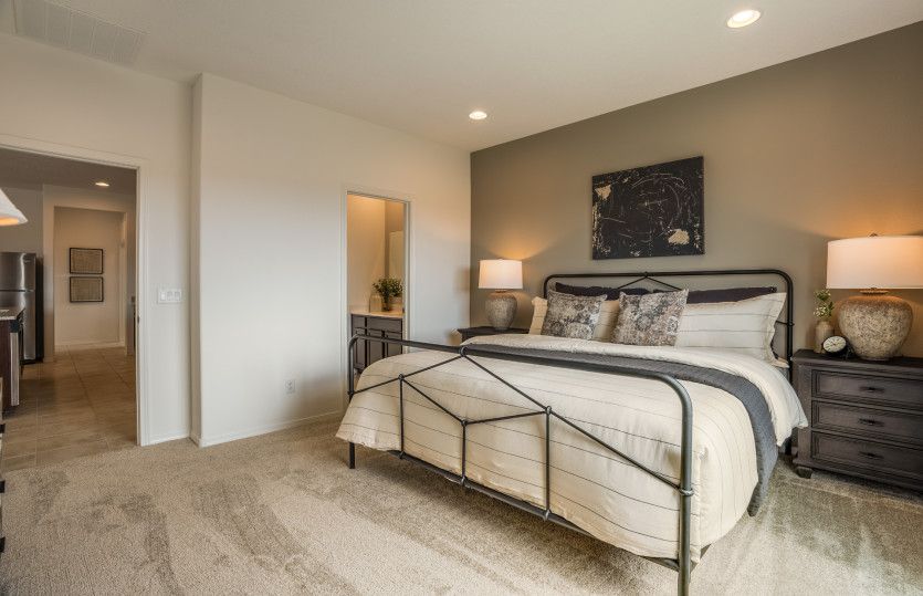 Enjoy recessed lighting and cozy carpet throughout the owner's suite.