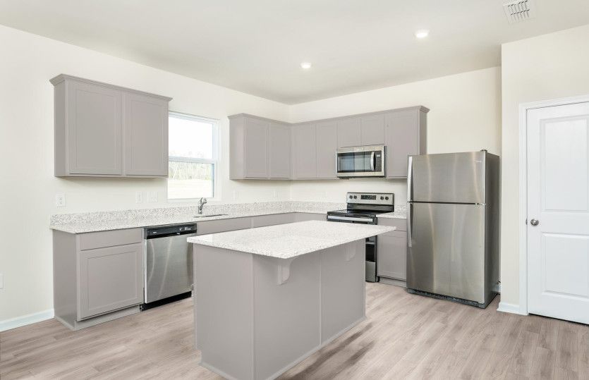 Package B Kitchen with beautiful gray cabinets and quartz countertops