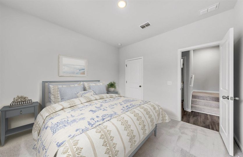Secondary bedroom perfect for overnight guests visits and additional storage opportunities.