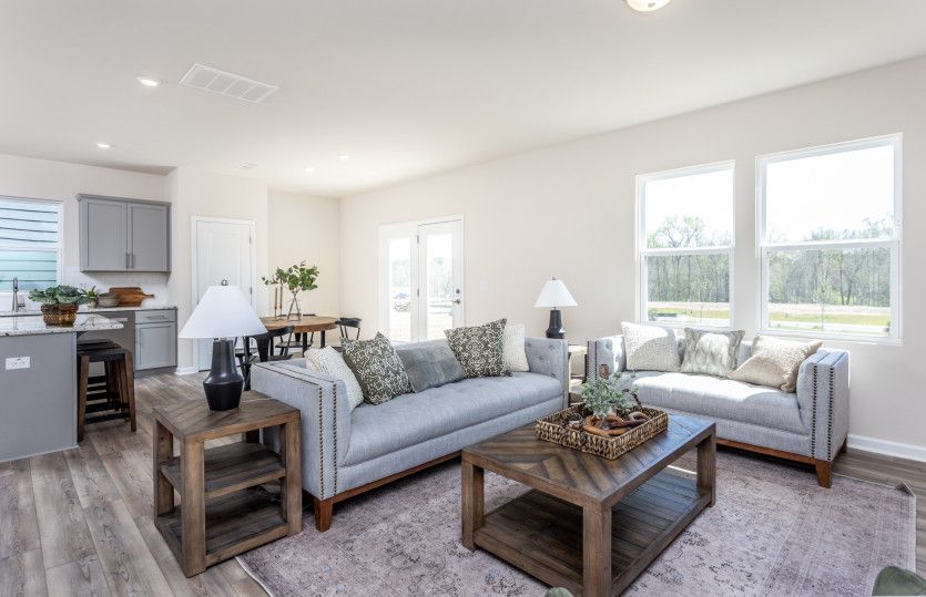 Spacious Gathering Room with Ample Natural Light - Model Representation