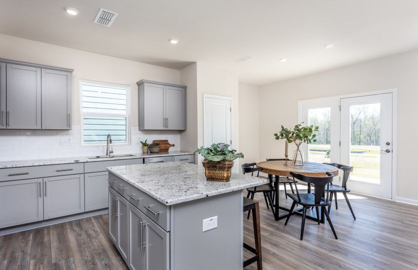 Cafe offers access to the Outdoor Patio for Dining & Grilling - Model Representation