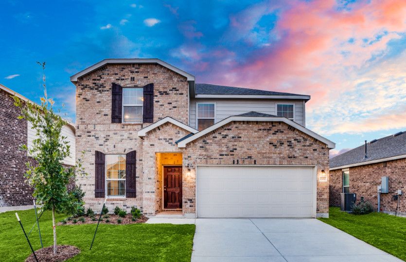 The Sandalwood, a two-story home with 2-car garage, shown with Home Exterior P