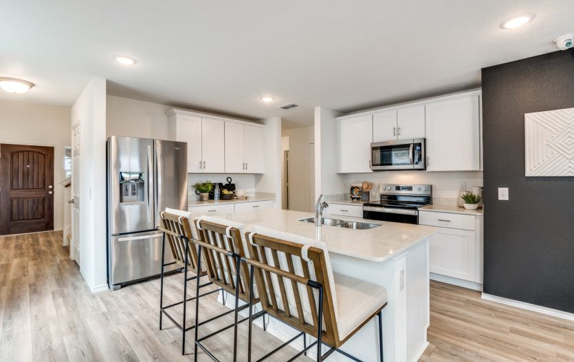Spacious kitchen with recessed lighting * model representation