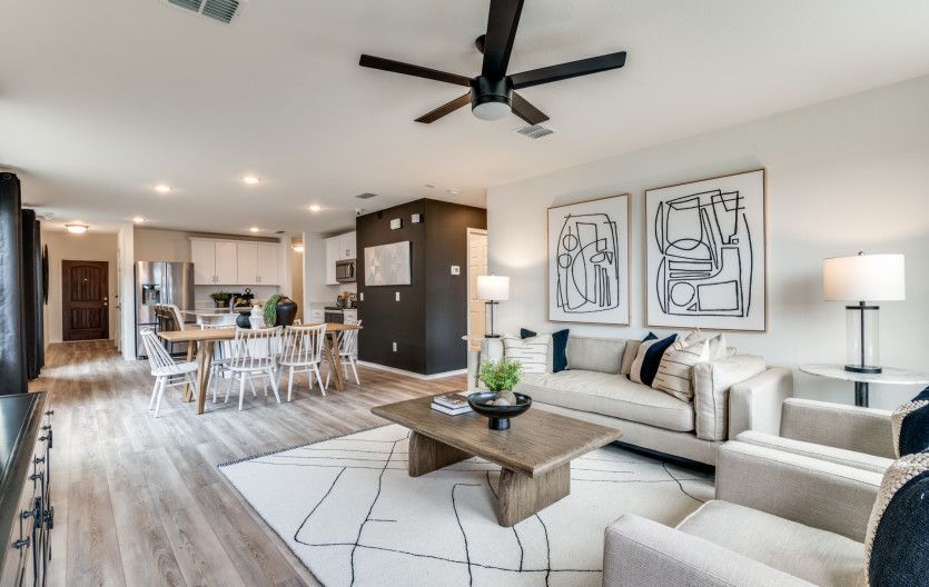 Gathering room with view of main living areas * model representation