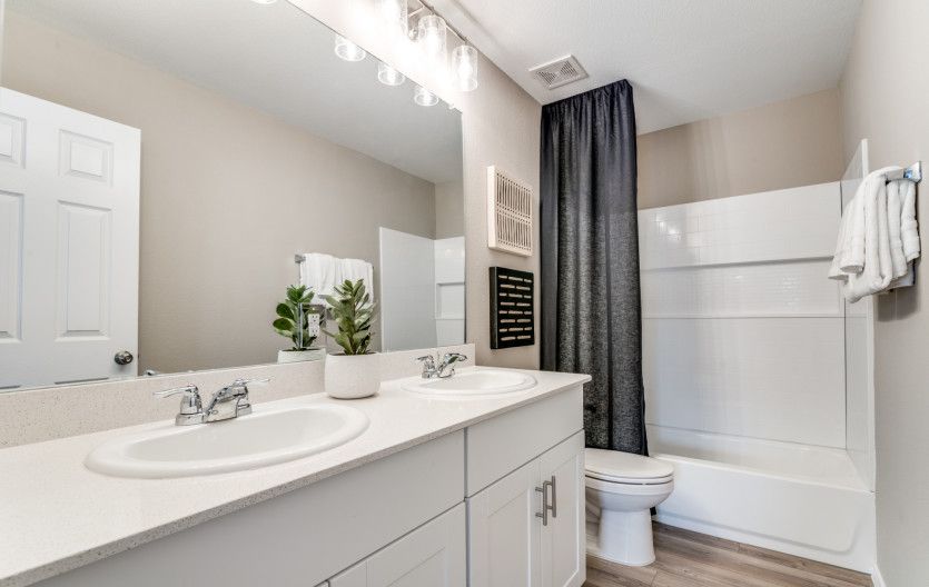 Spacious secondary bath * model representation