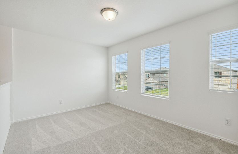 Spacious game room with large windows