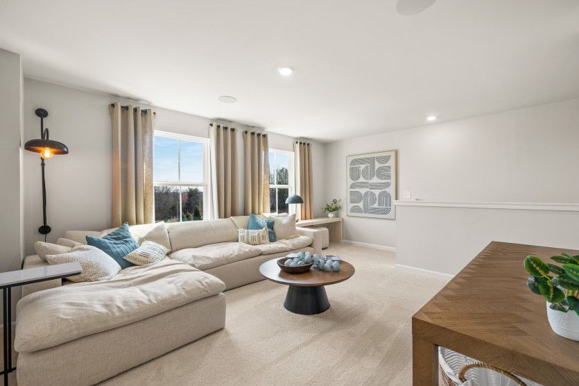 The loft is a bright, open space that feels both modern and inviting. With its high ceilings and lar