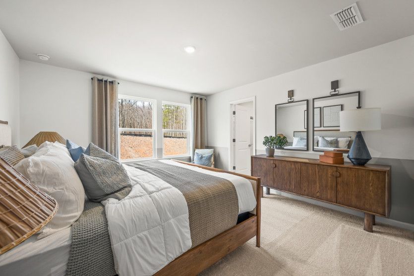 Retreat to your Owner's Suite with plenty of space for a luxurious king-sized bed.