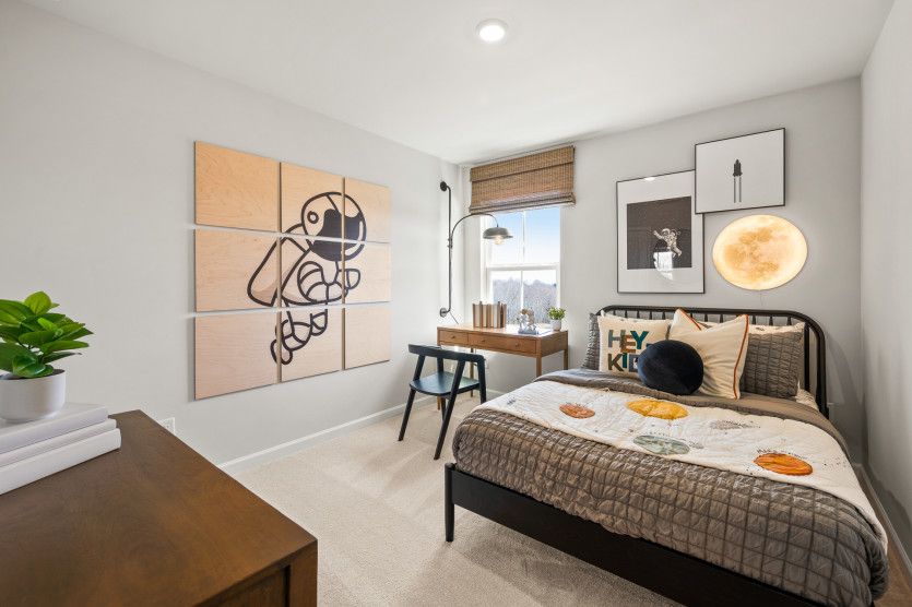 Make every square foot count with a secondary bedroom designed for relaxation.