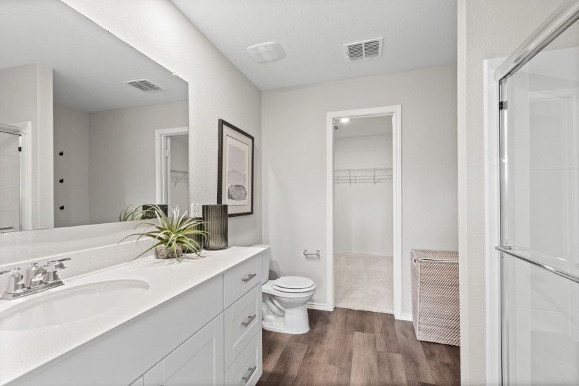Owner's Bathroom with Double Vanity Sinks