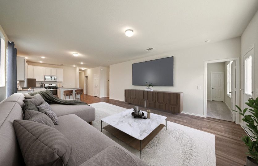 Airy gathering room showcases open concept floorplan