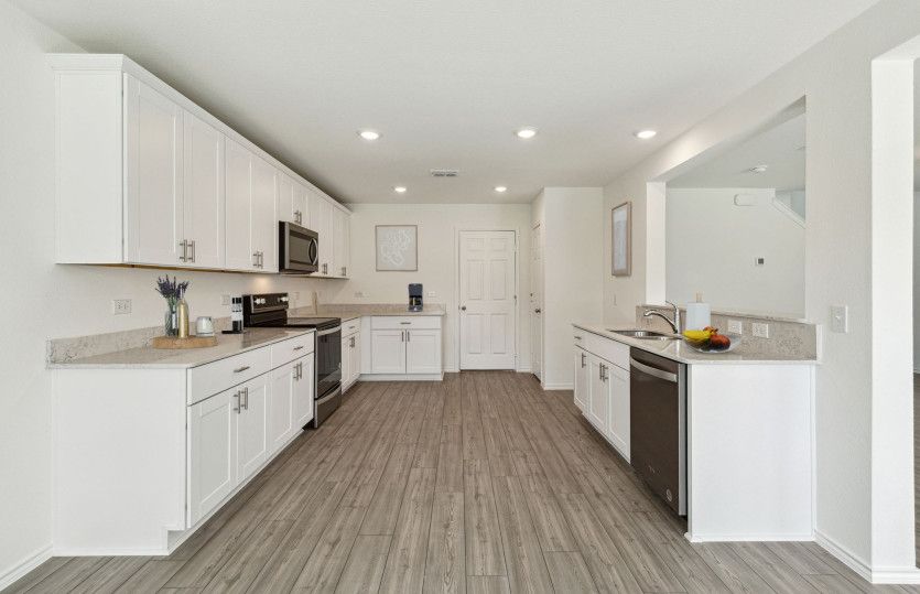 High-end gourmet kitchen with premium finishes and upgraded appliances