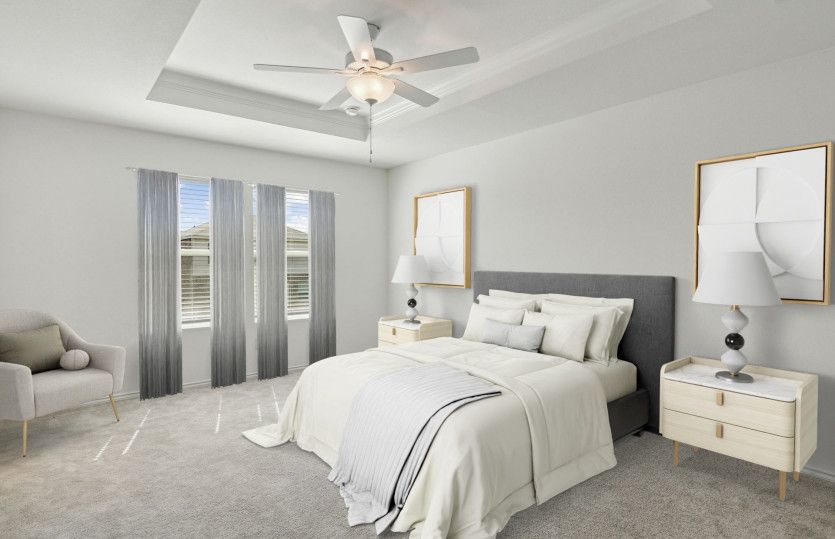 Spacious owner's suite highlighted by large windows and an exquisite tray ceiling
