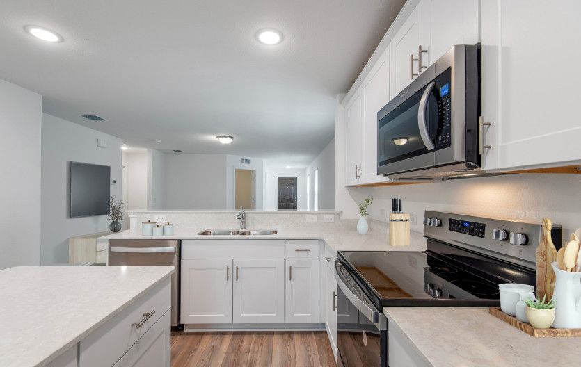 Spacious eat-in kitchen designed with a large island for dining