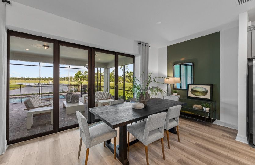 Cafe area located right off of the kitchen and gathering room | Model Representation