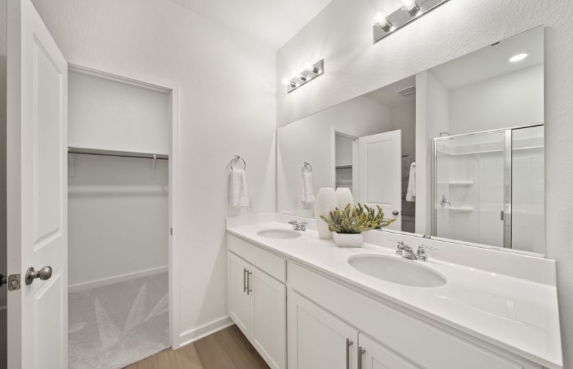 Owner's Bathroom with Double Vanity Sinks
