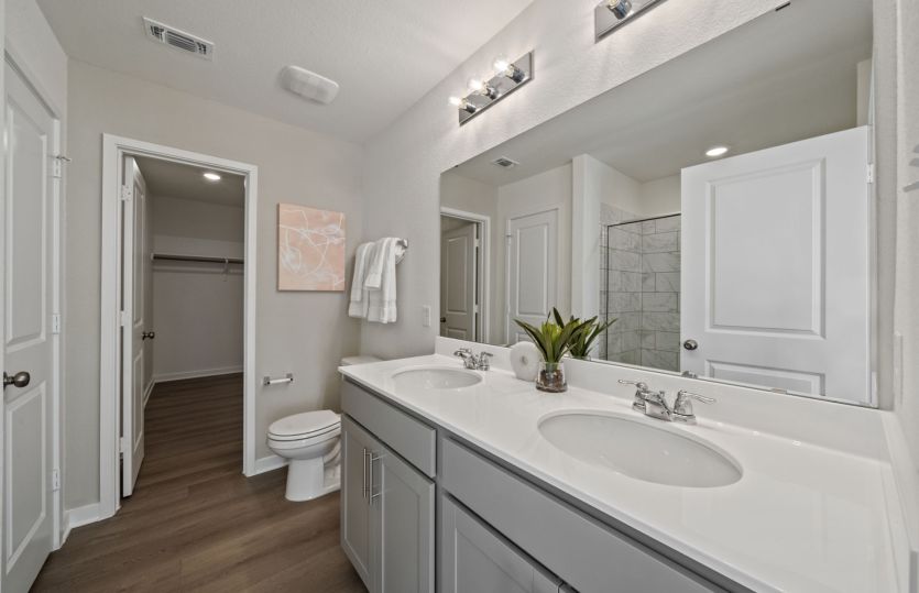 Owner's Bathroom with Double Vanity Sinks
