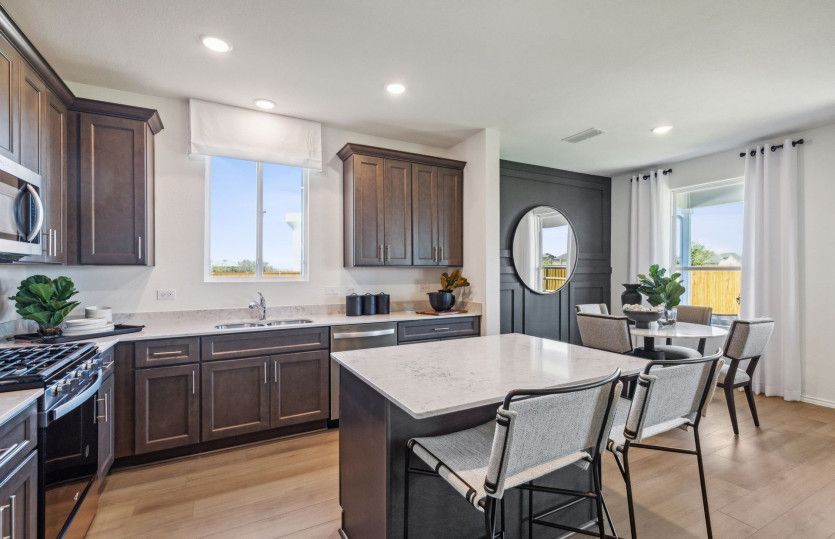 Natural and pendant lighting in kitchen*model representation