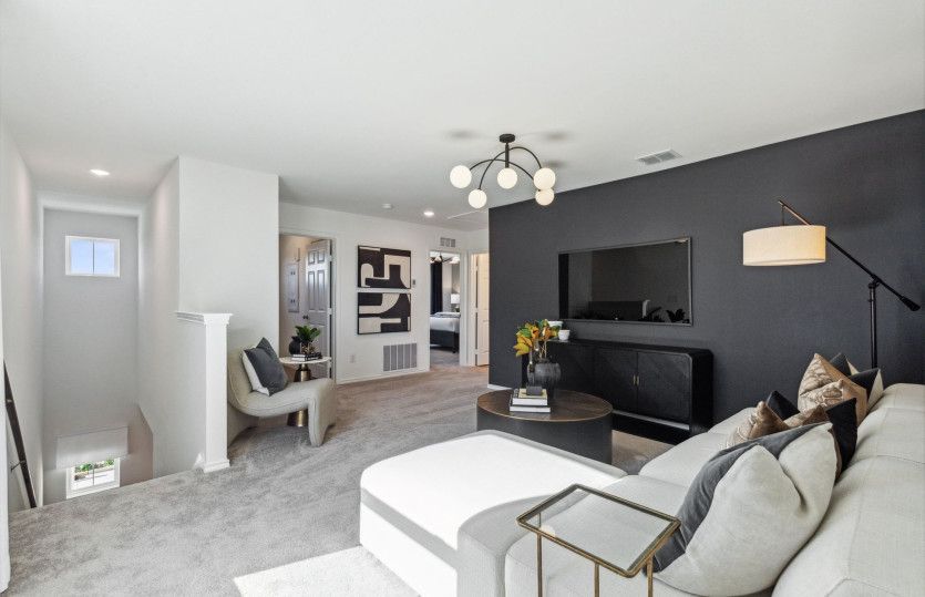 Spacious game room on second floor*model representation