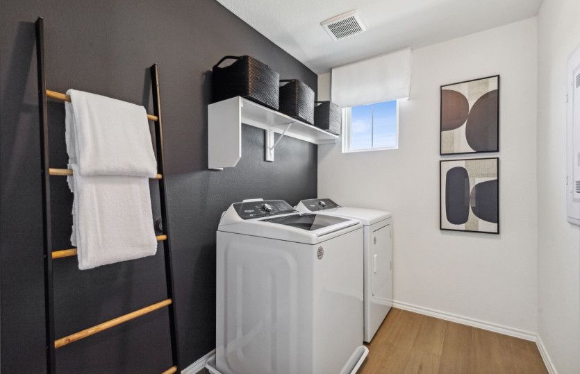 Spacious laundry room*model representation