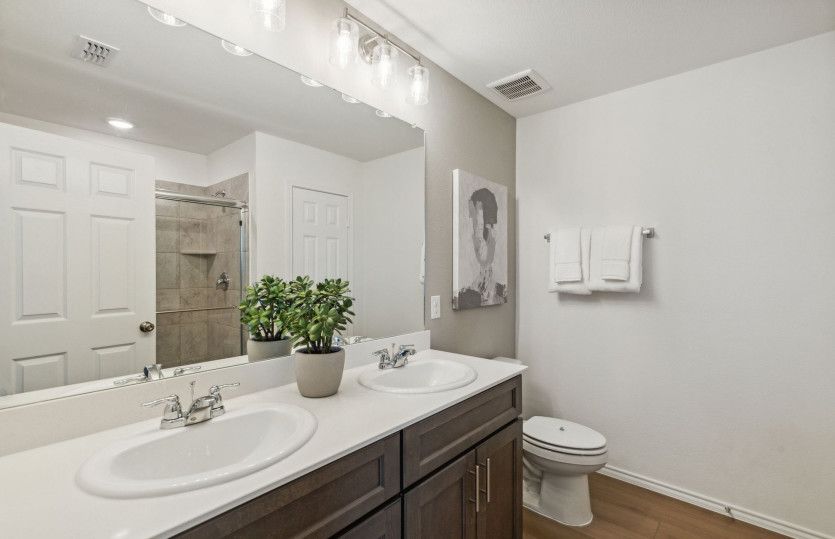 Owner's bath with double vanity*model representation